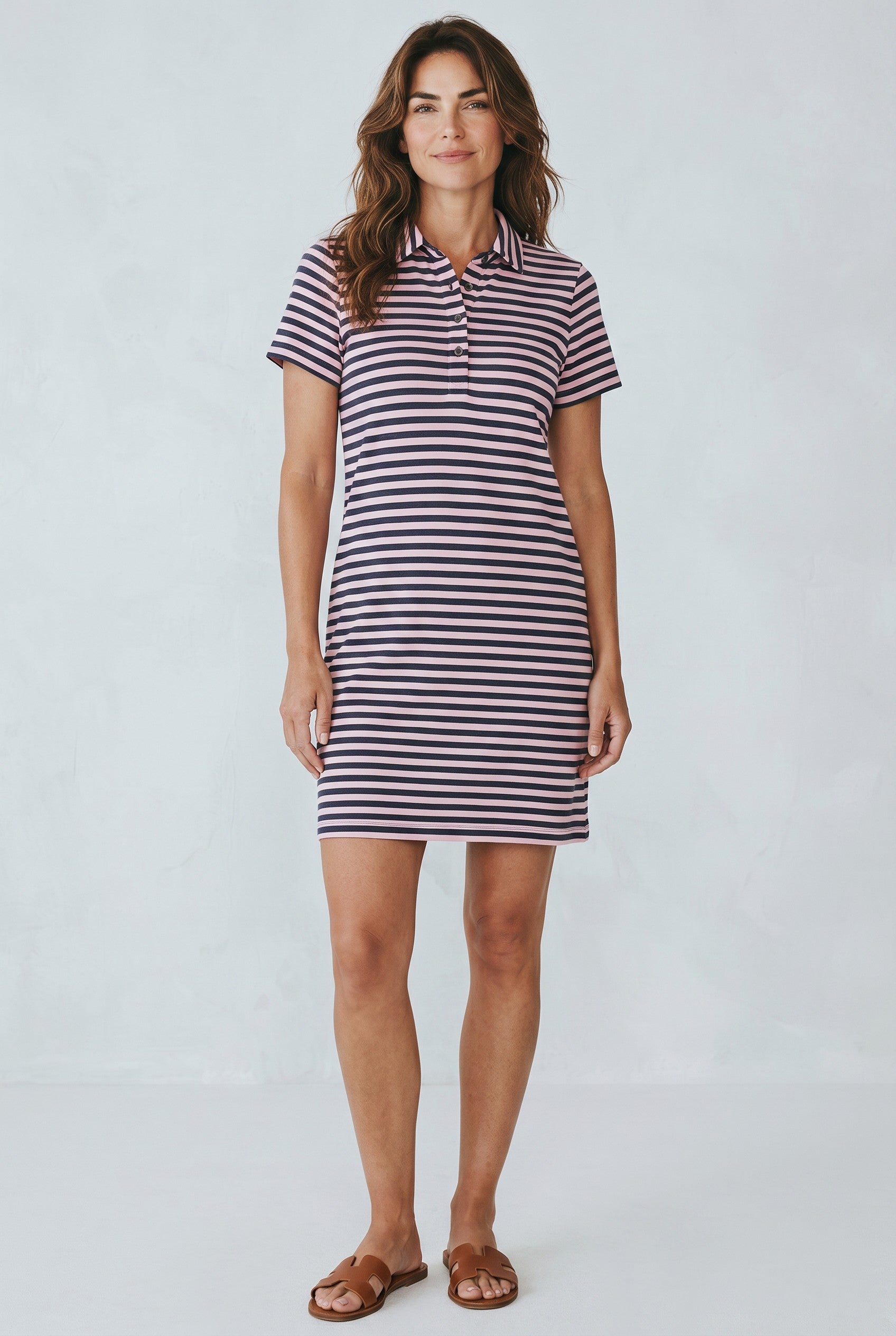 Woman wearing the J Society Polo Striped Dress in Pink Jilli Boutique