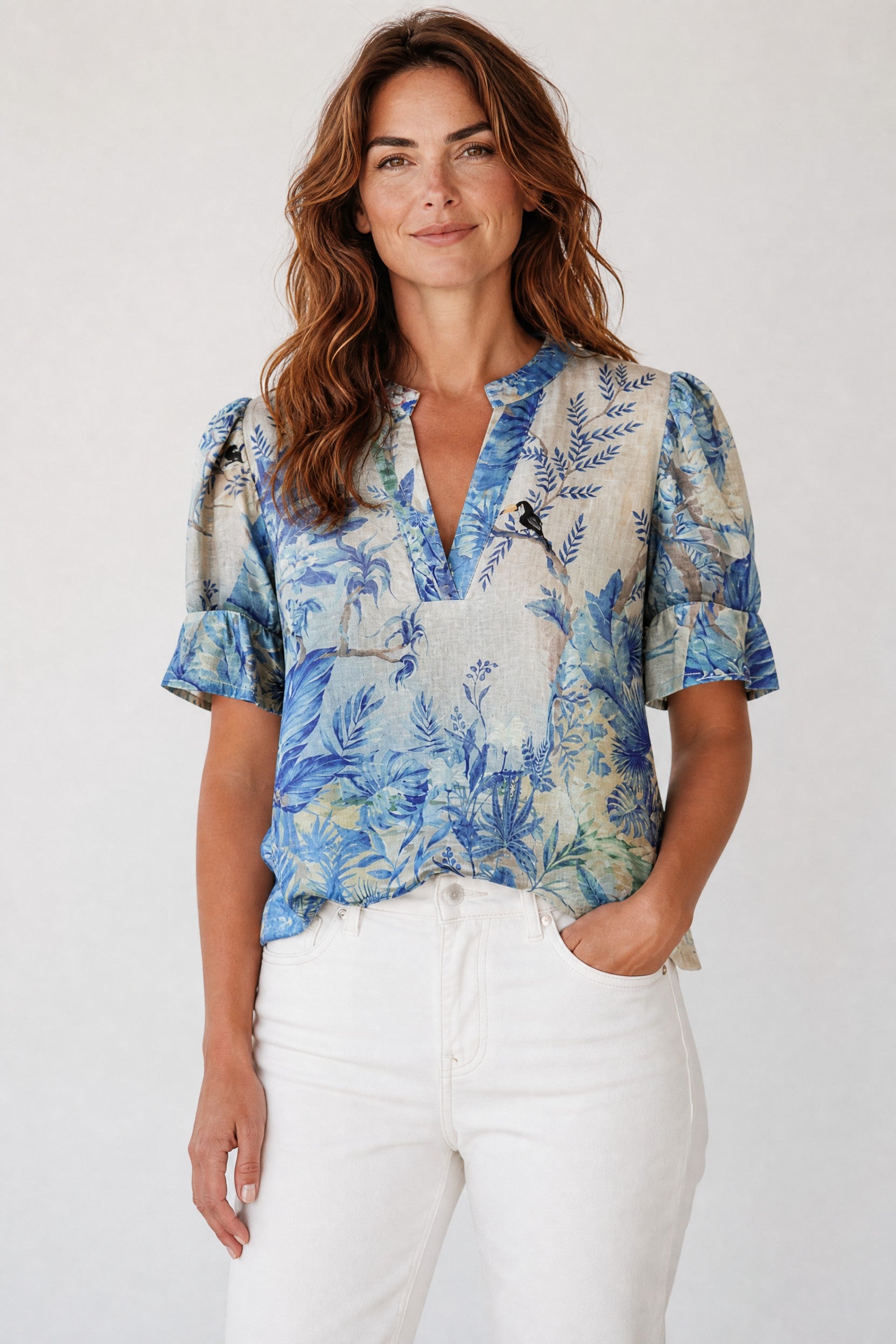Woman wearing the Robin Blouse in Sky Blue Mystic by Babette Jilli Boutique